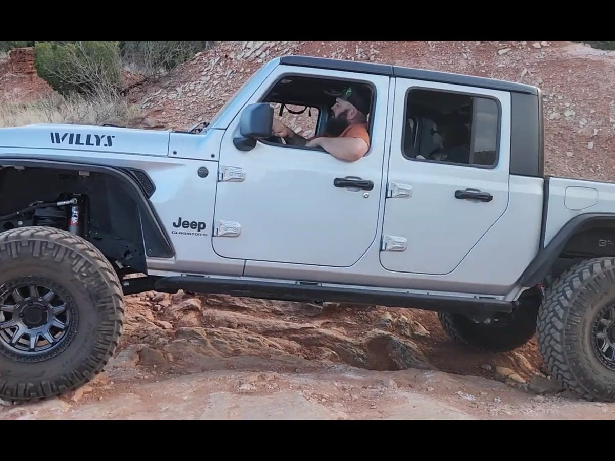 A trail-built rig out wheeling