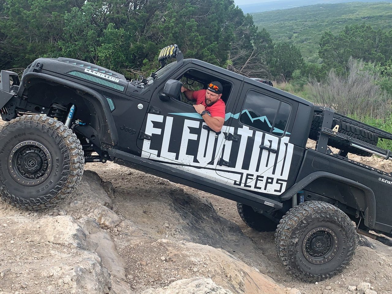 An Elevation build crawling the rocks on the trail