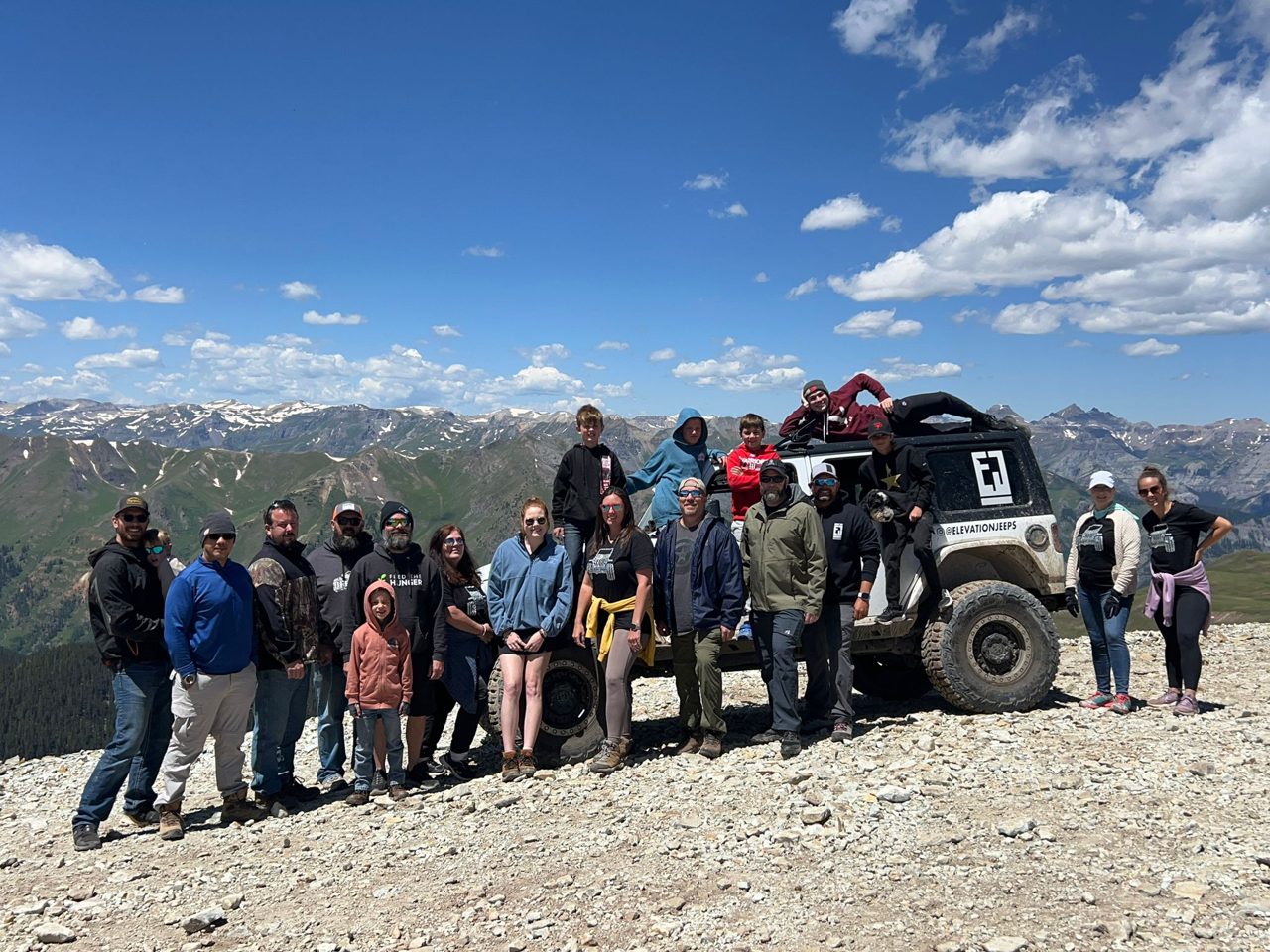 The Elevation Nation crew at a mountain summit