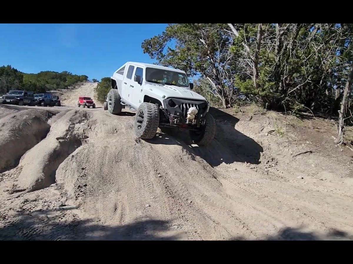 A Jeep working through a rock garden