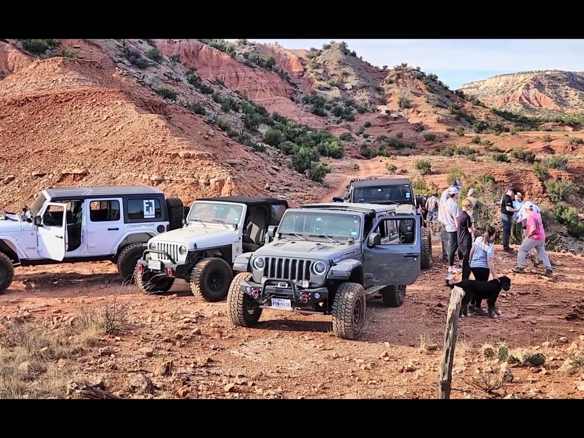 A Jeep rock crawling on the trail
