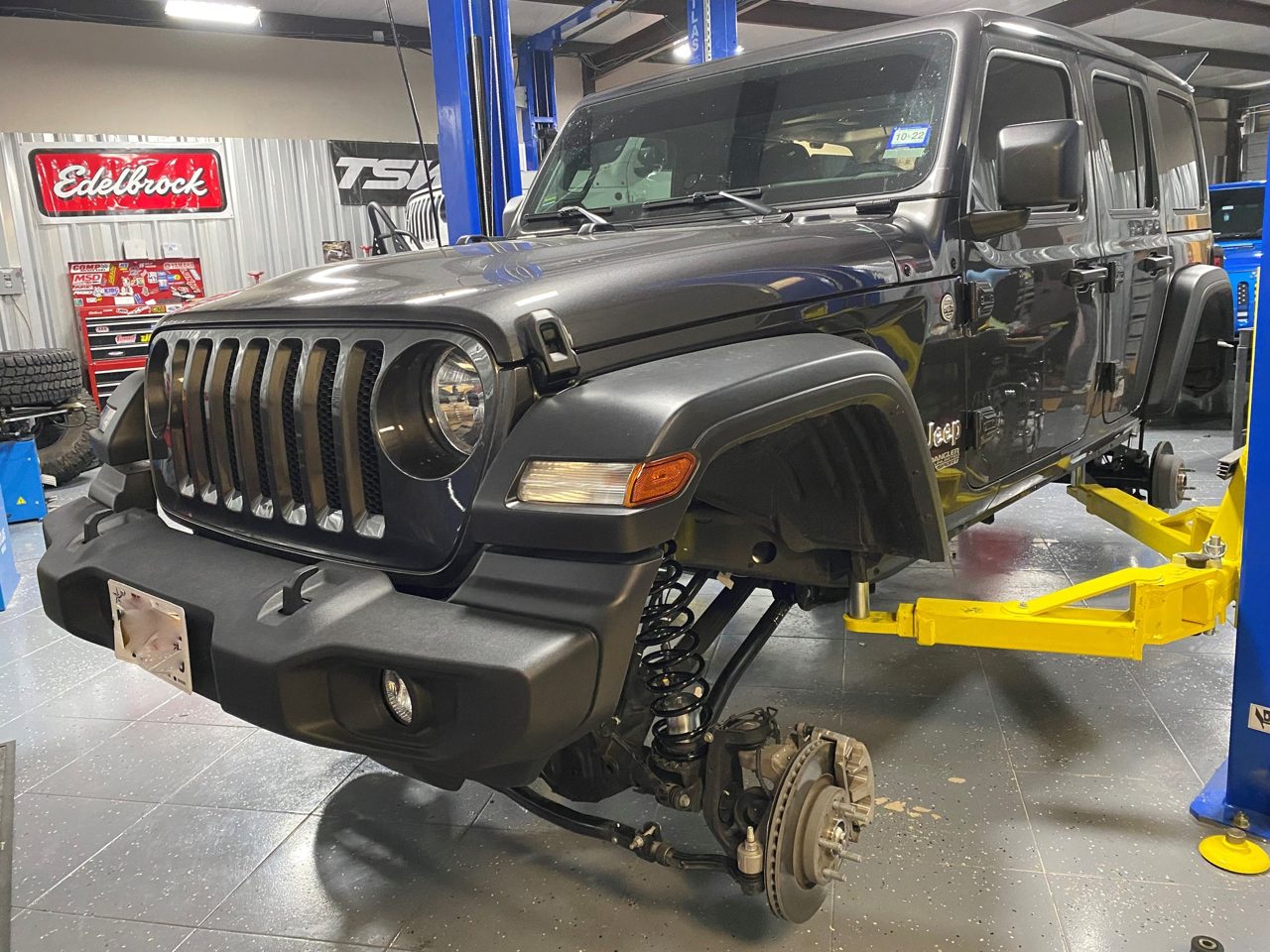 Front-end work on a Jeep in the shop